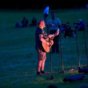 Sandy Black playing guitar at Blair Atholl Jamborette